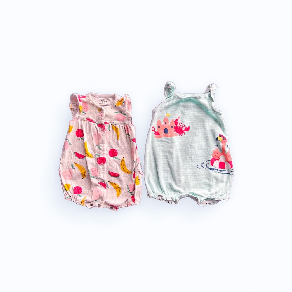 2 Carter’s Rompers. Size 6 months.